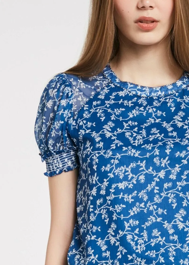 Blusa con maniche a palloncino
