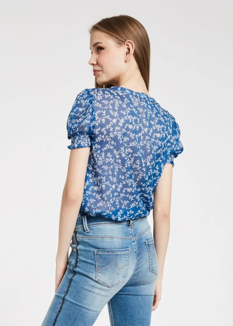 Blusa con maniche a palloncino